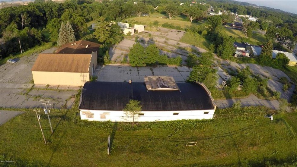 Primary Photo Of 10 Caberfae Hwy, Manistee Service For Sale
