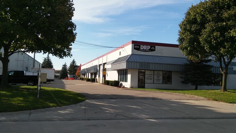 More Photos Of 8341-8351 Ronda Dr, Canton Manufacturing For Lease