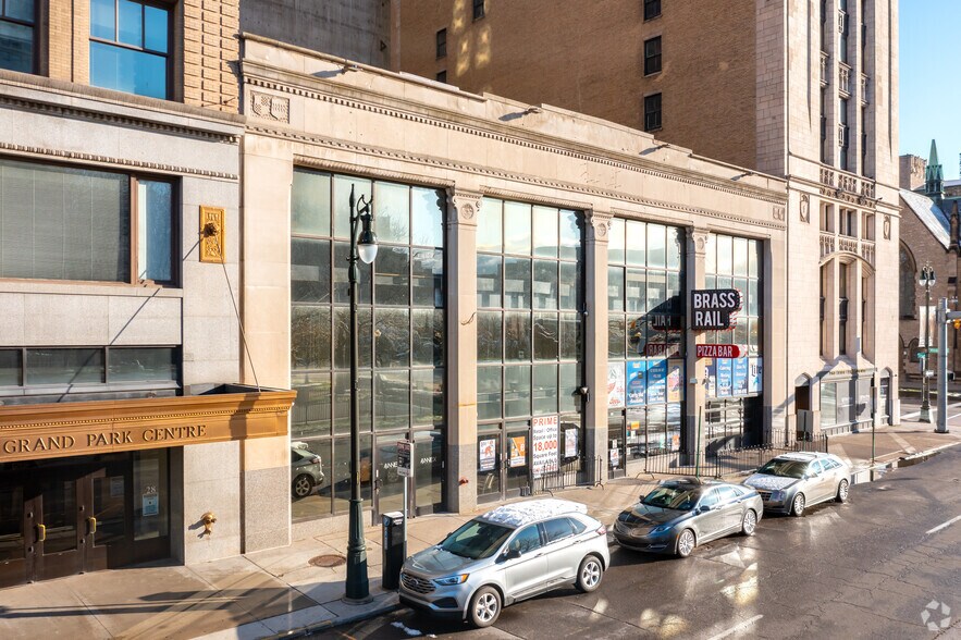 Primary Photo Of 18-24 W Adams Ave, Detroit Storefront Retail Office For Sale