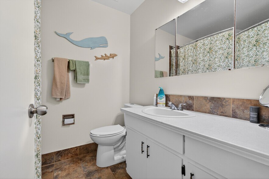 More Photos Of 5015 48 St, Legal Apartments For Sale