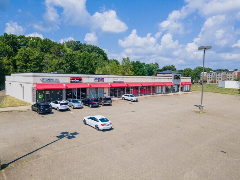 Primary Photo Of 2052-2070 Romig Rd, Akron Storefront For Sale