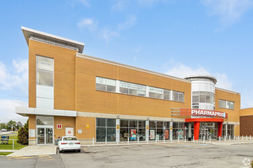 More Photos Of 10-18 Pl De La Triade, Pointe-claire Freestanding For Lease