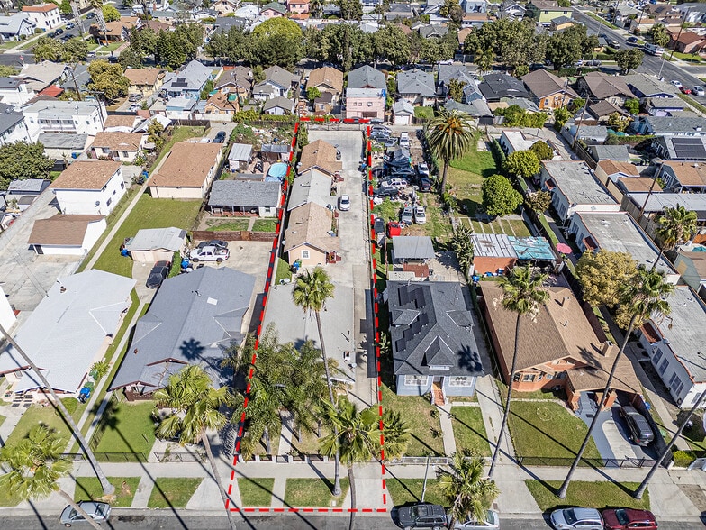 Primary Photo Of 1565 W 51st St, Los Angeles Multifamily For Sale