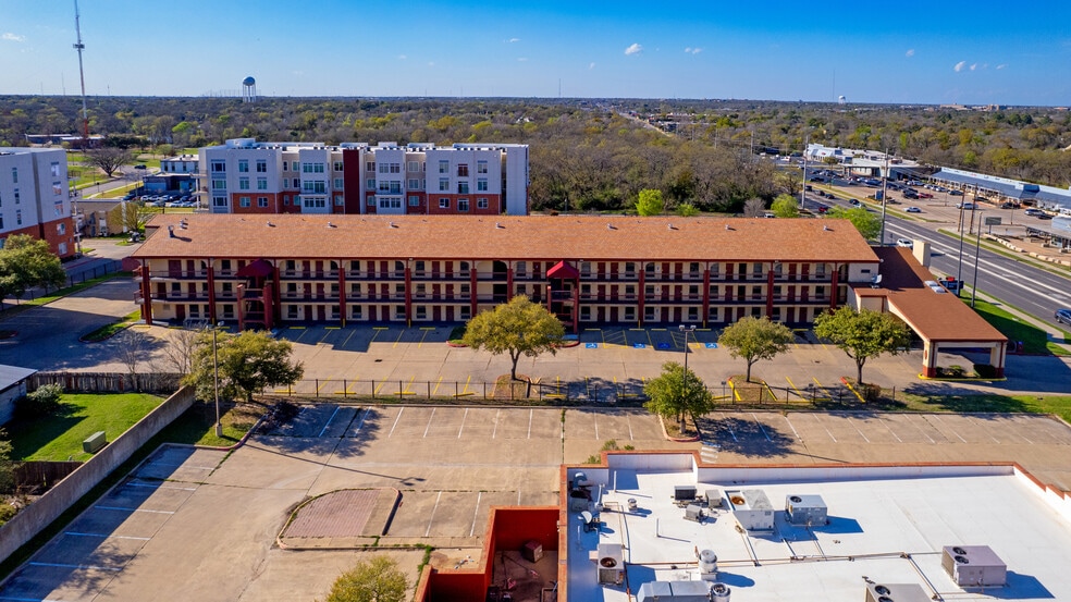 Primary Photo Of 104 Texas Ave S, College Station Hotel For Sale