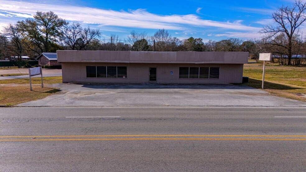Primary Photo Of 310 E Denman Ave, Lufkin Storefront Retail Office For Sale