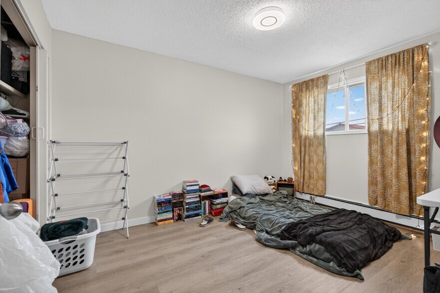 More Photos Of 5015 48 St, Legal Apartments For Sale