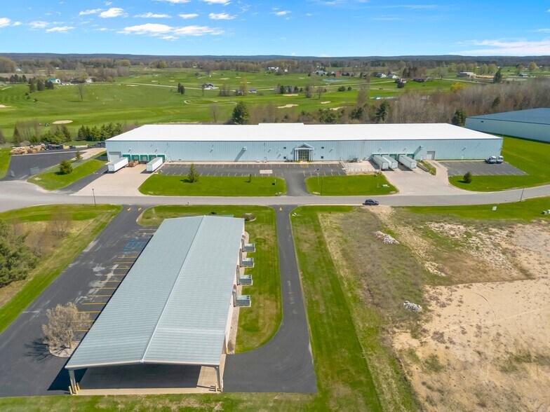 Primary Photo Of 1250 Commerce Dr, Farwell Manufacturing For Sale