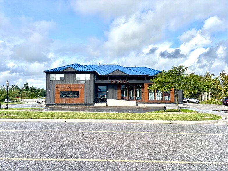 Primary Photo Of 810 S Huron, Mackinaw City Storefront Retail Residential For Sale