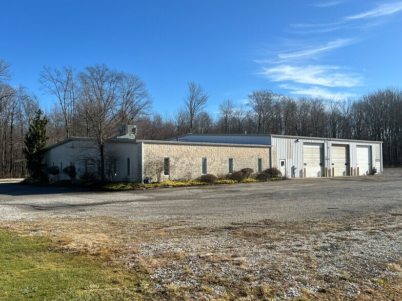 Primary Photo Of 7171 W Ridge Rd, Fairview Warehouse For Sale