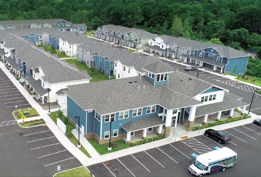 Primary Photo Of 7112 NY-104, Oswego Apartments For Sale
