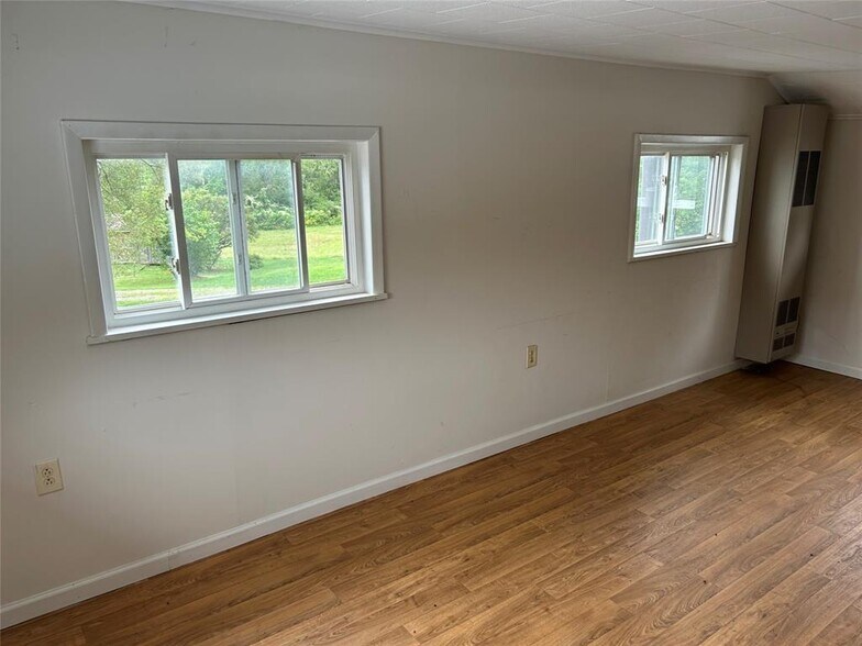 More Photos Of 13087 Main st, Titusville Storefront Retail Residential For Sale