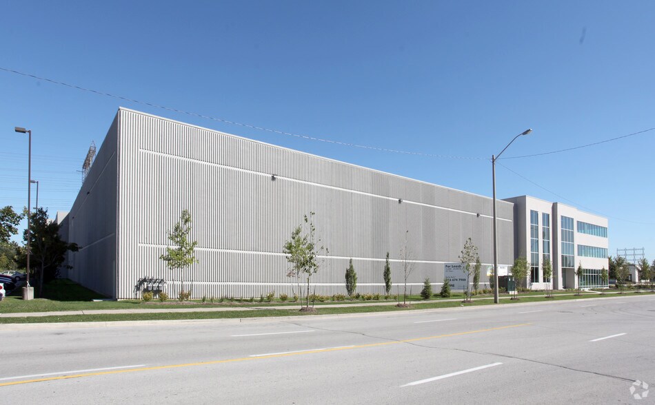 Primary Photo Of 105 Queens Plate Dr, Toronto Warehouse For Lease