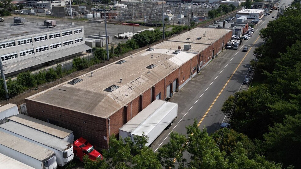 Primary Photo Of 75-79 Commercial Ave, Garden City Warehouse For Lease