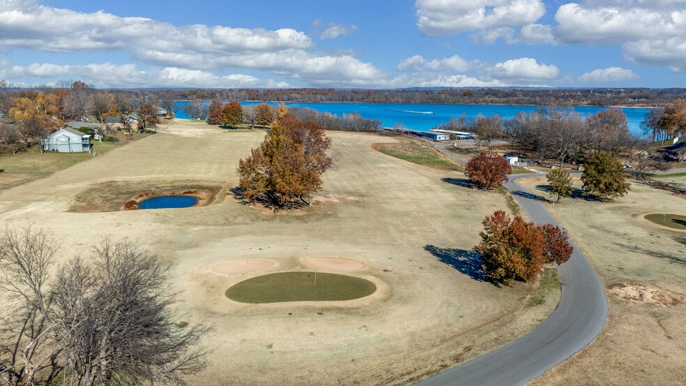More Photos Of 519 Quail Run Rd, Grove Golf Course Driving Range For Sale