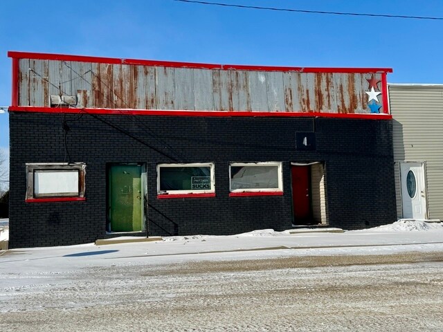More Photos Of 100 N Chicago St, Magnolia General Retail For Sale