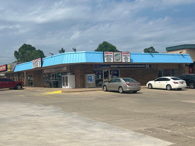 Primary Photo Of 110-112 S Bryant Ave, Edmond Convenience Store For Lease