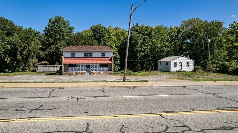 Primary Photo Of 3950 Parkman Rd, Warren Storefront Retail Residential For Sale