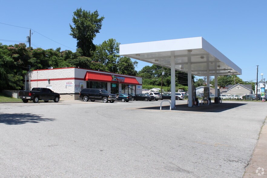Primary Photo Of 8815 N Broadway St, Saint Louis Service Station For Sale
