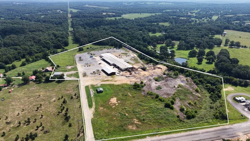 Primary Photo Of 1920 US 59, Stilwell Warehouse For Sale