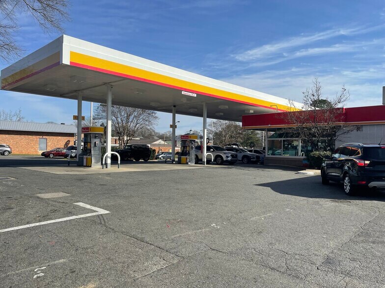 Primary Photo Of 100 E John St, Matthews Convenience Store For Sale