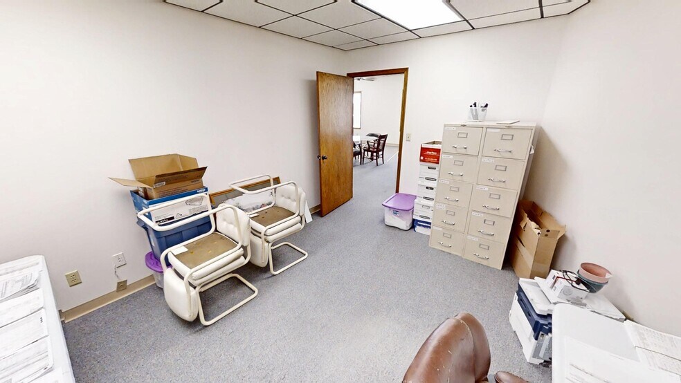 More Photos Of 103-105 E 27th St, Hays Office For Sale