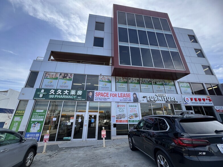 Primary Photo Of 7402 Grand Ave, Elmhurst Storefront Retail Office For Lease