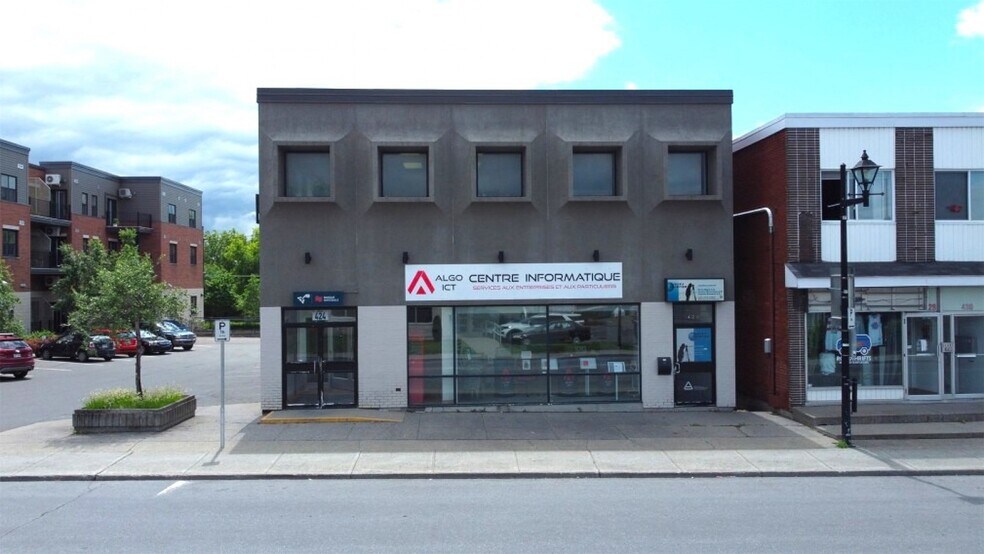 Primary Photo Of 424-426 Rue Principale, Granby Storefront Retail Office For Sale