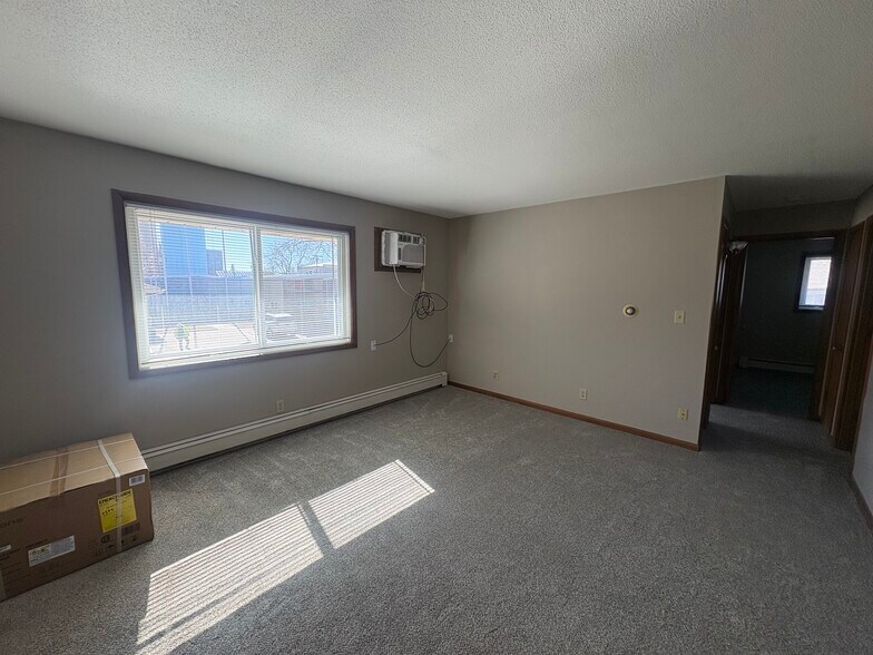 More Photos Of 113 2nd St NE, Mitchellville Apartments For Sale