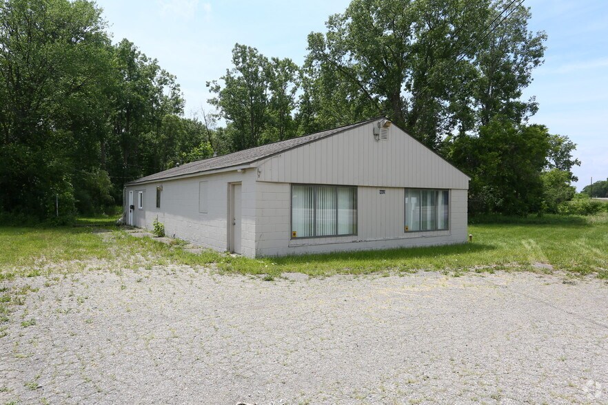 Primary Photo Of 9669 Highland Rd, White Lake Township Freestanding For Sale