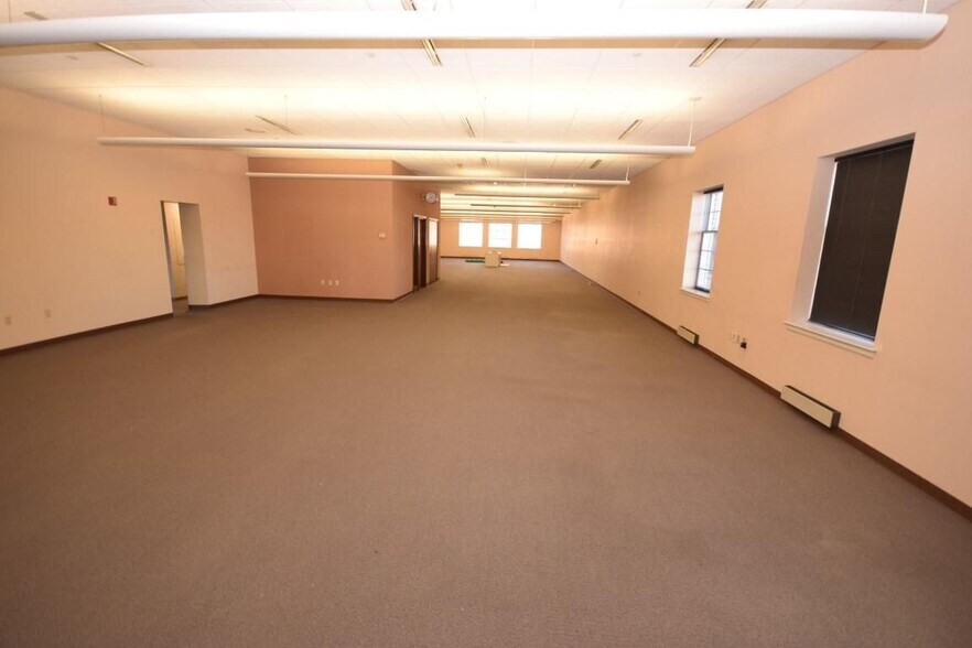 More Photos Of 215 MAIN STREET ZEILGLER BUILING, West Bend Office For Lease