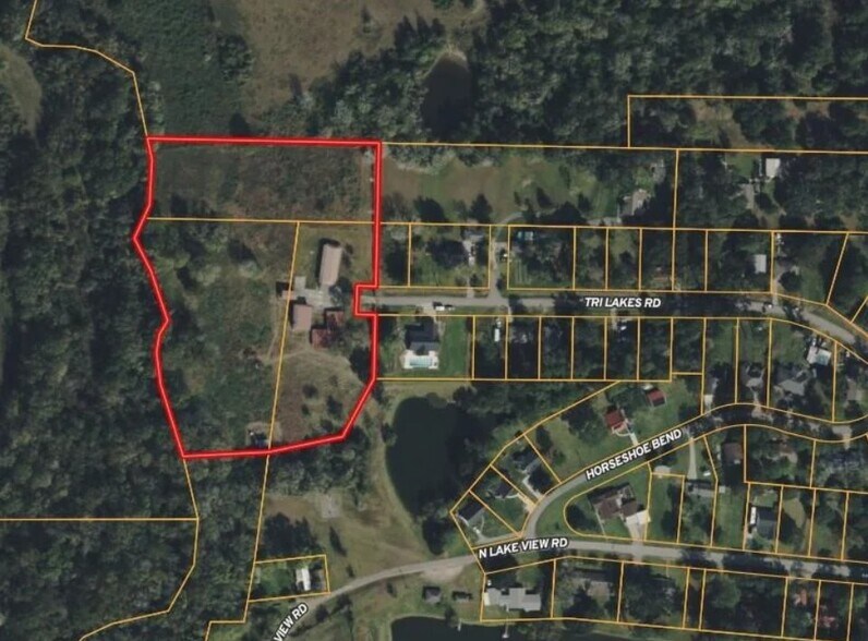 Primary Photo Of 23909 Tri Lakes Rd, Montgomery Land For Sale