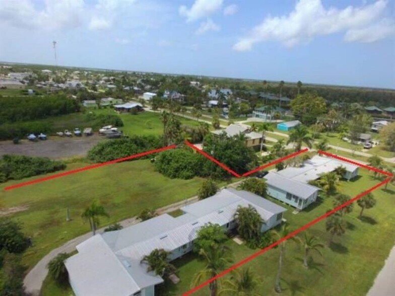 Primary Photo Of 110 Freesia Street, Everglades City Apartments For Sale