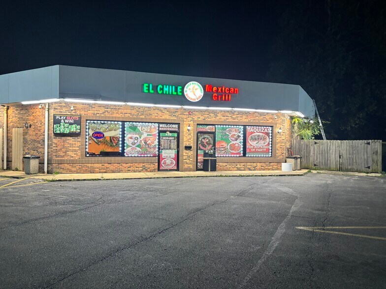 Primary Photo Of 410 E South St, Plano Convenience Store For Sale