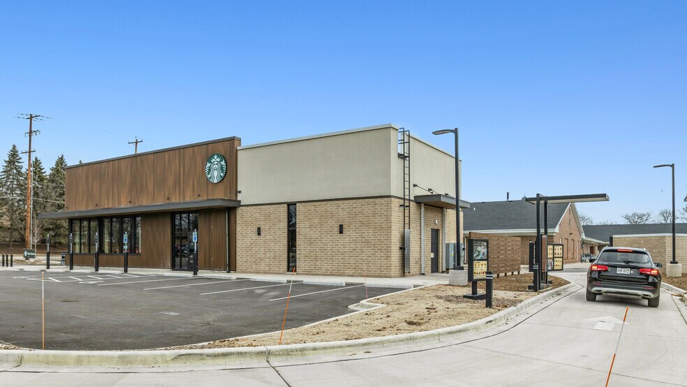 More Photos Of 143 W Sunset Dr, Waukesha General Retail For Sale