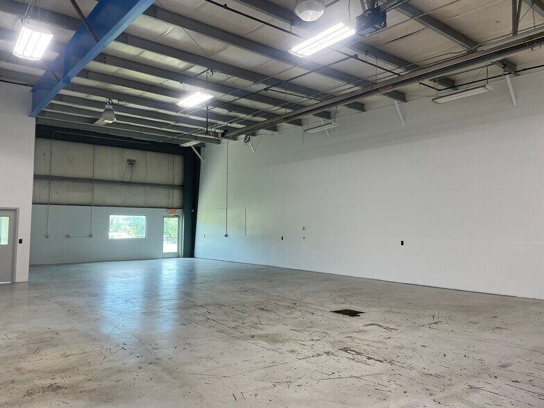 More Photos Of 7084 Big Sky Dr, Holly Warehouse For Lease