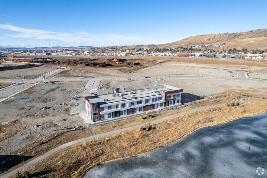 More Photos Of 422 Greystone blvd, Cochrane Storefront Retail Office For Sale