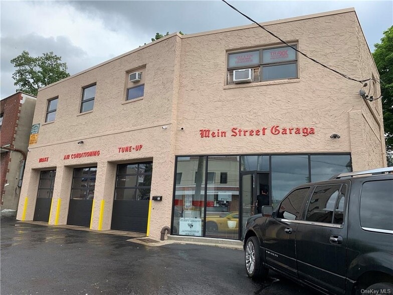 Primary Photo Of 68 E Main St, Elmsford Auto Repair For Sale