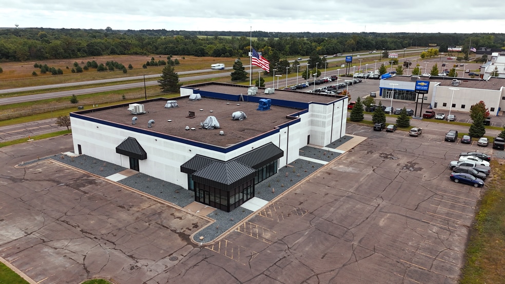 Primary Photo Of 38450 Tanger Dr, North Branch Service Station For Sale