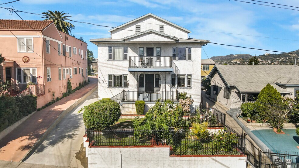 Primary Photo Of 1437 Lucile Ave, Los Angeles Multifamily For Sale