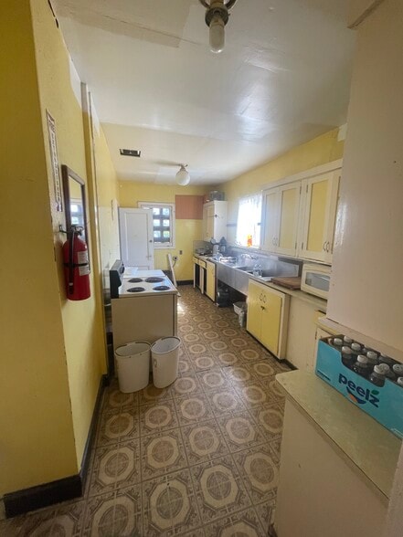 More Photos Of 9970-74 Main St, Zamora Religious Facility For Sale