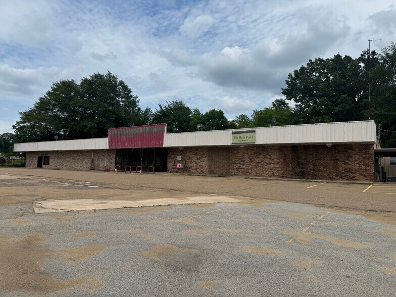 Primary Photo Of 802 US Highway 59, Queen City General Retail For Sale