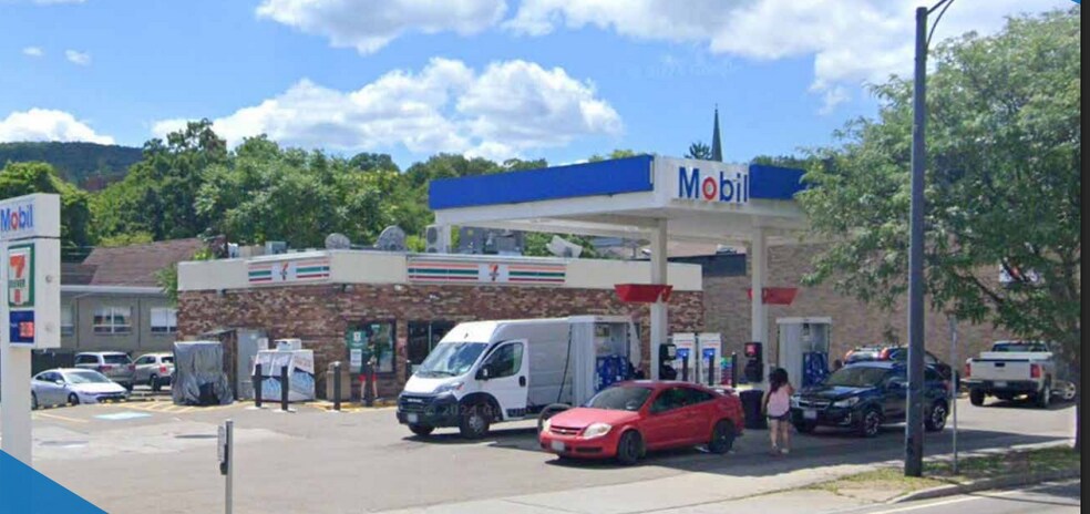 Primary Photo Of 40 Denison Pky E, Corning Service Station For Sale