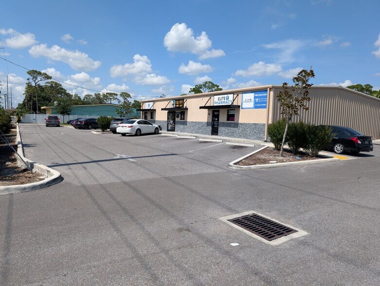 Primary Photo Of 7011 N Manhattan Ave, Tampa General Retail For Sale