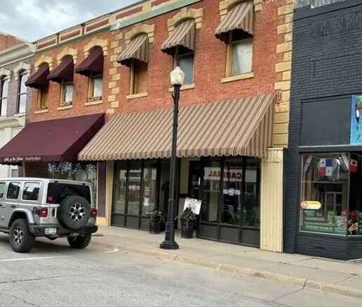 Primary Photo Of 110 E Main St, Chanute Storefront Retail Office For Sale