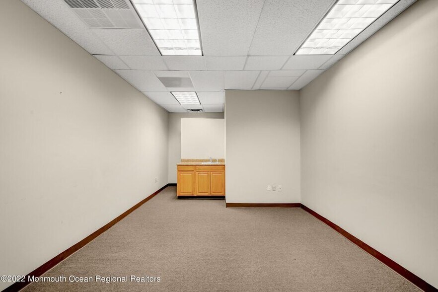 More Photos Of 704 Ginesi Dr, Morganville Light Distribution For Lease