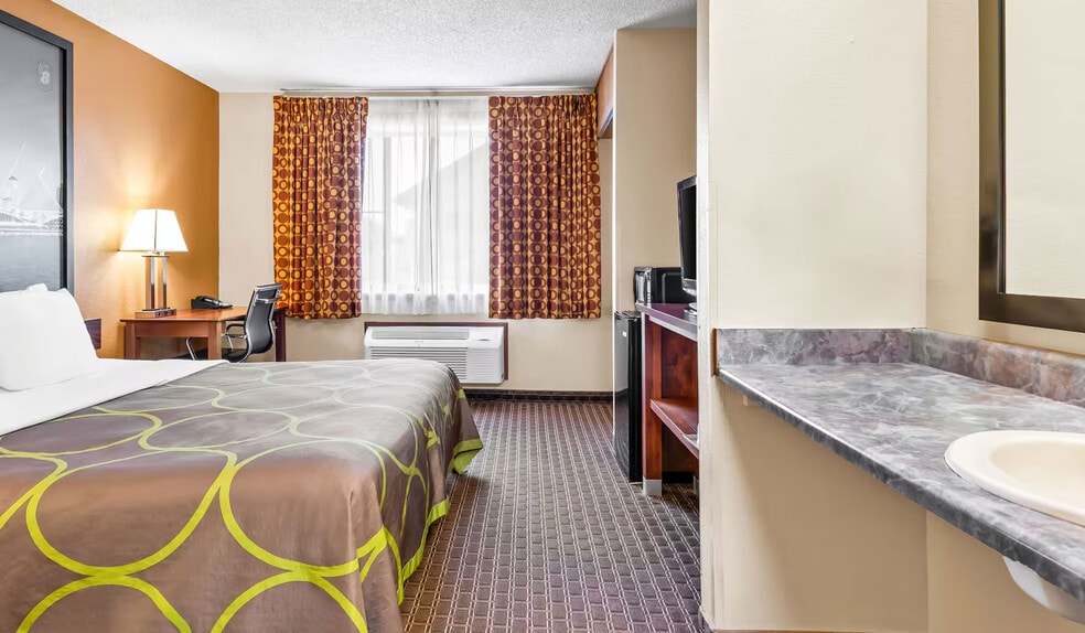 More Photos Of 910 S Sylvania Ave, Sturtevant Hotel For Sale