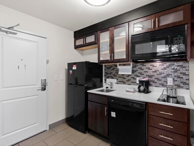 More Photos Of 1220 E Douglas Rd, Granger Hotel For Sale