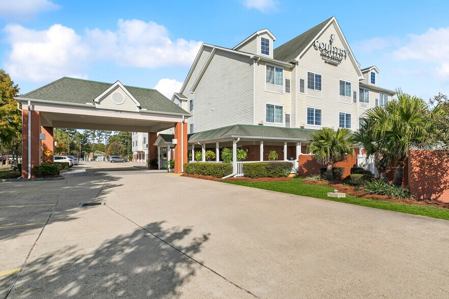 More Photos Of 130 Holiday Blvd, Covington Hotel For Sale