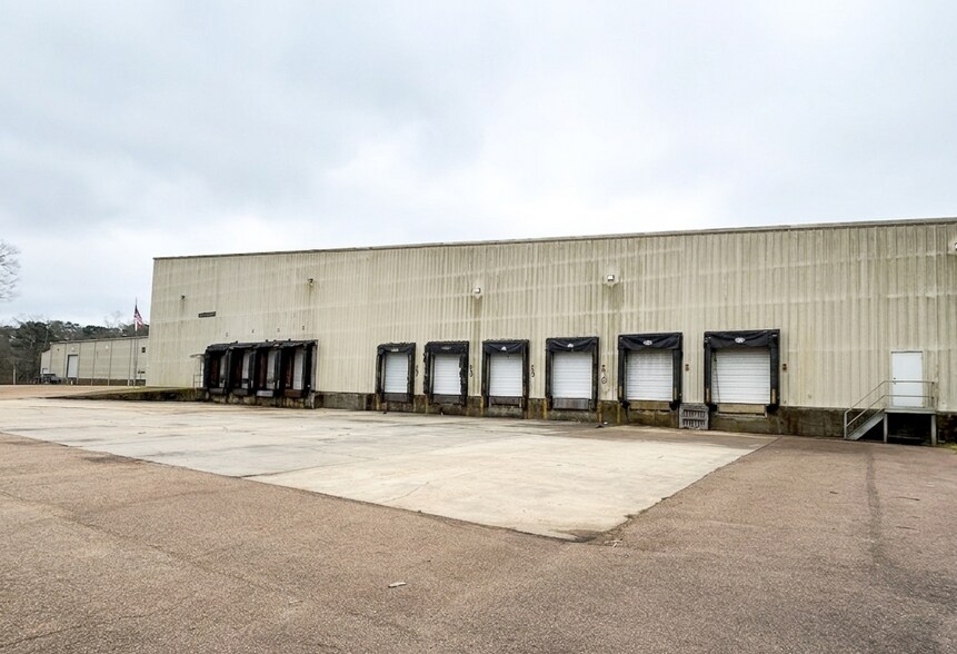 More Photos Of 130 Coby Dr, Magee Manufacturing For Lease