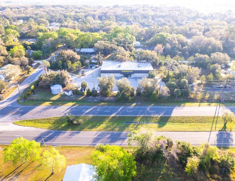 Primary Photo Of 3795 SUMMER St, Mims Convenience Store For Sale